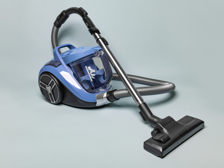 Vacuum cleaner on a neutral background.